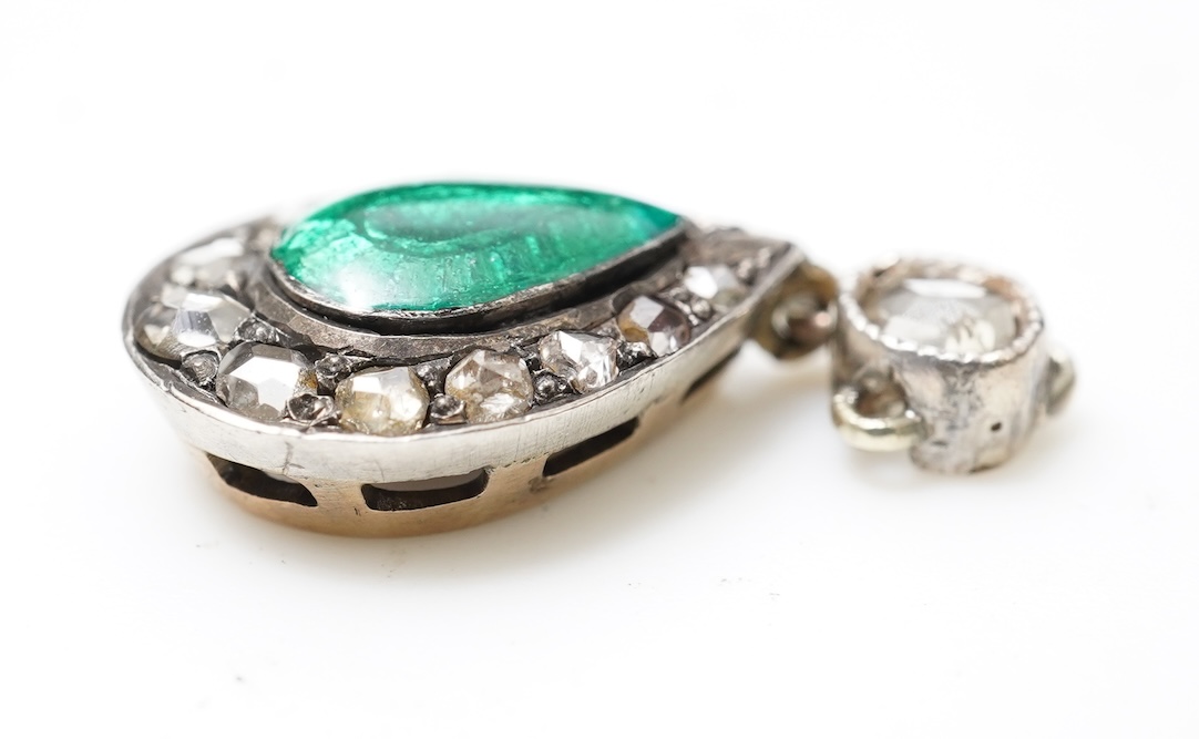 A sapphire bar brooch and an enamel and diamond pendant, early 20th century